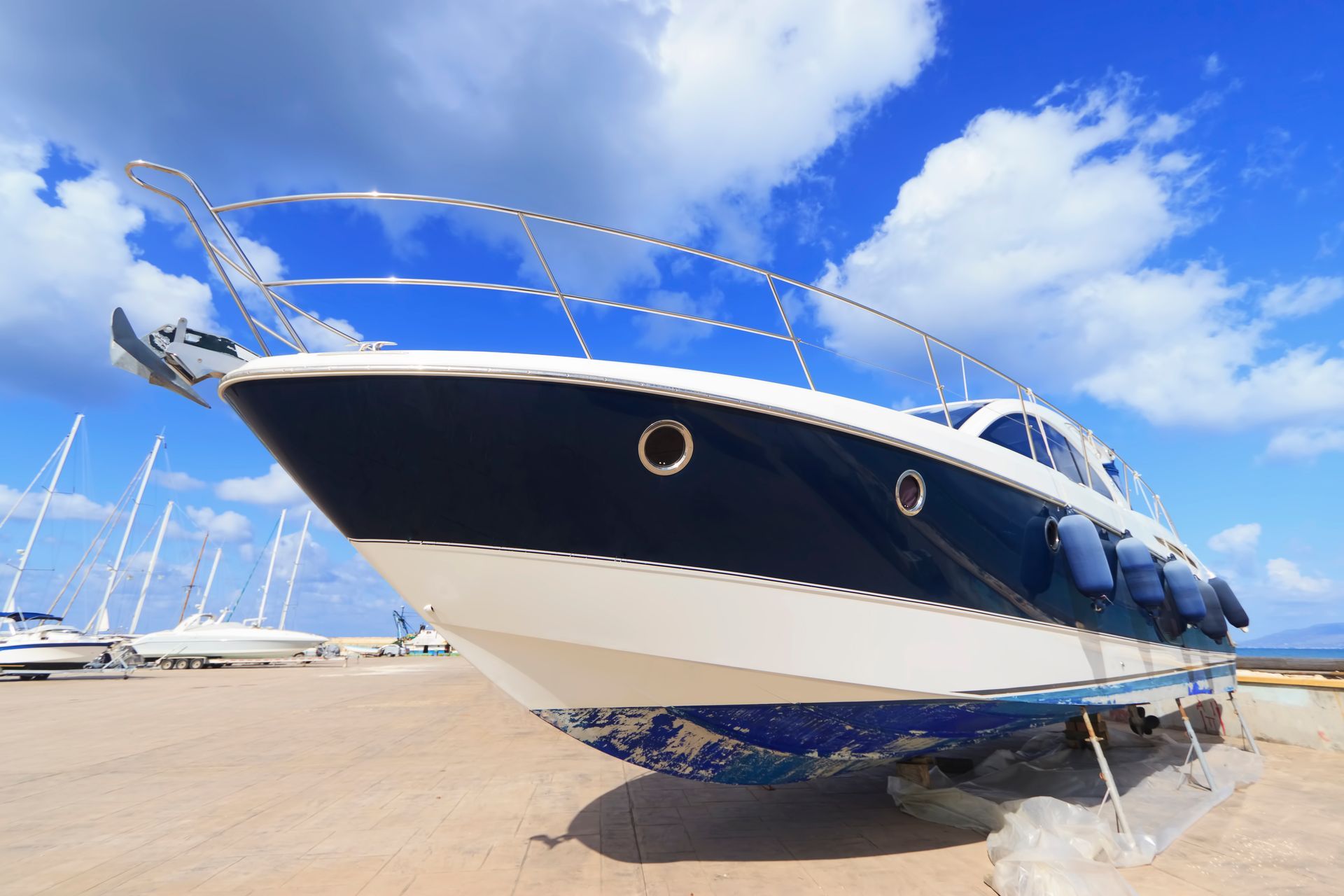 Blue yacht on land