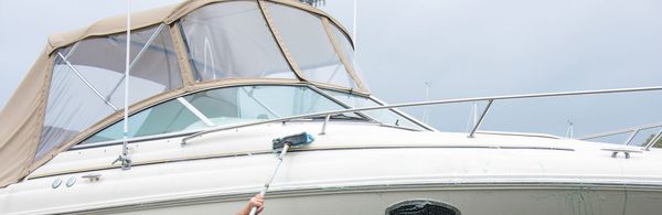 Washing a white boat