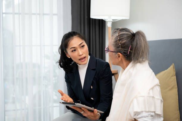 Senior Talking To Insurance Company Agent | Little Rock, AR | TChase Healthcare Solutions