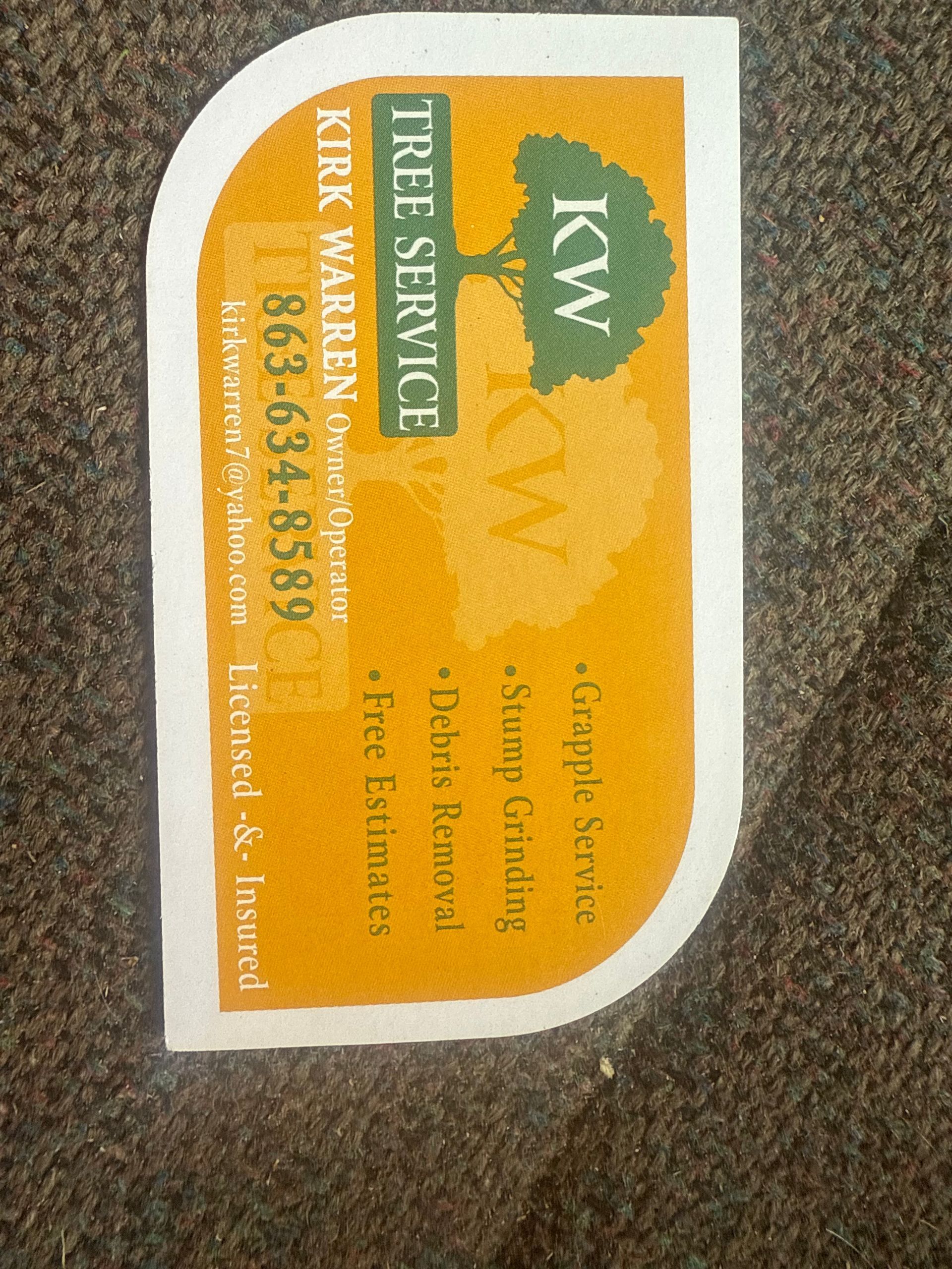 Orange The Service Milk Bar business card with KW logo and contact details.