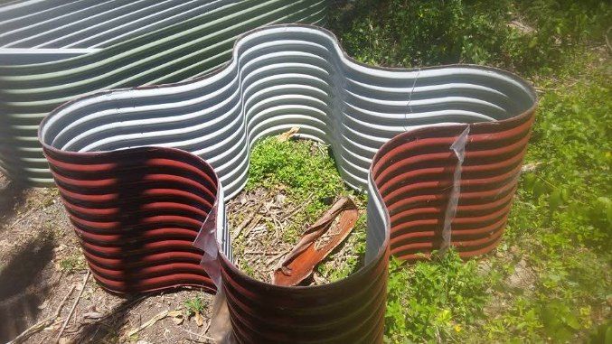 Shamrock Shaped Garden Bed Ready To Be Installed — Foley's Tanks in Caloundra, QLD
