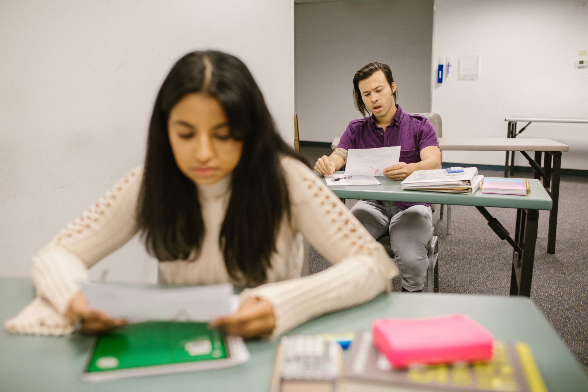 Pre-K through 12th grade students in a group learning session at Optimal Academy