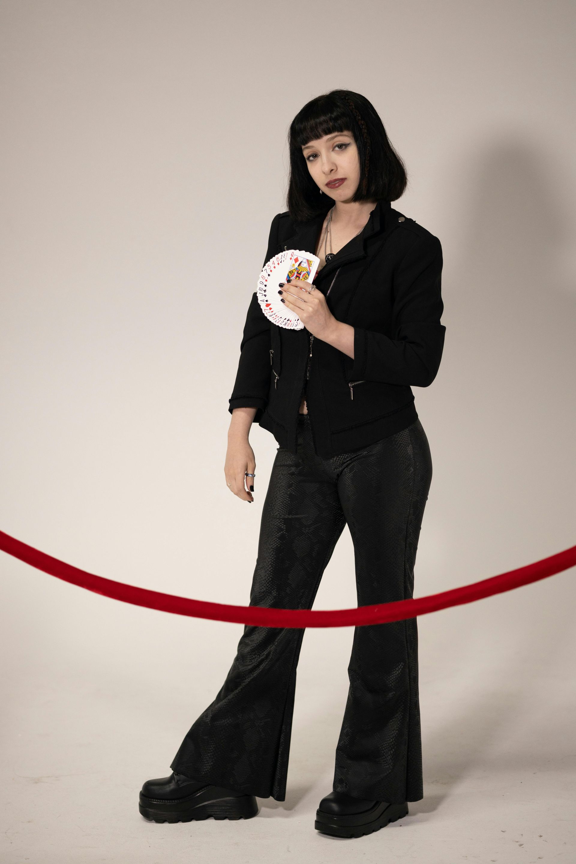 A female magician fanning the cards