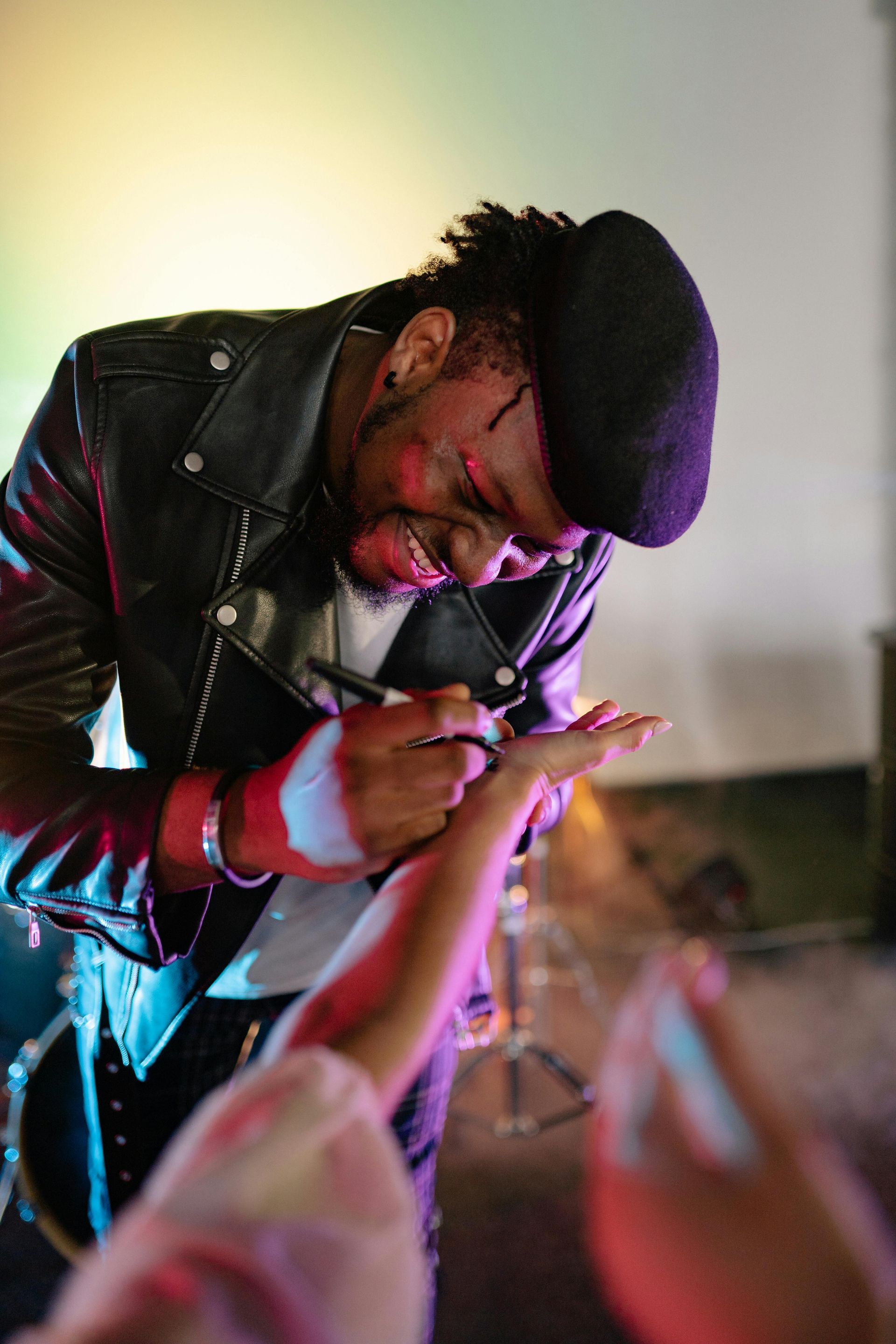 Celebrity impersonator signing autographs