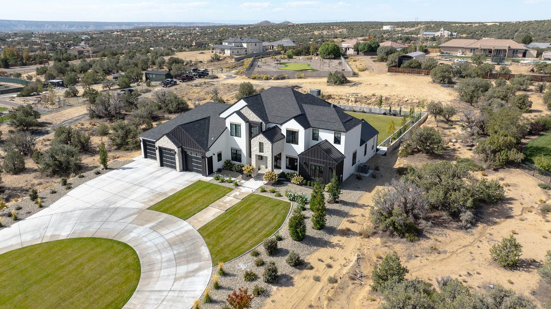 Asphalt shingle, metal and tile roofing materials suitable for northern New Mexico properties