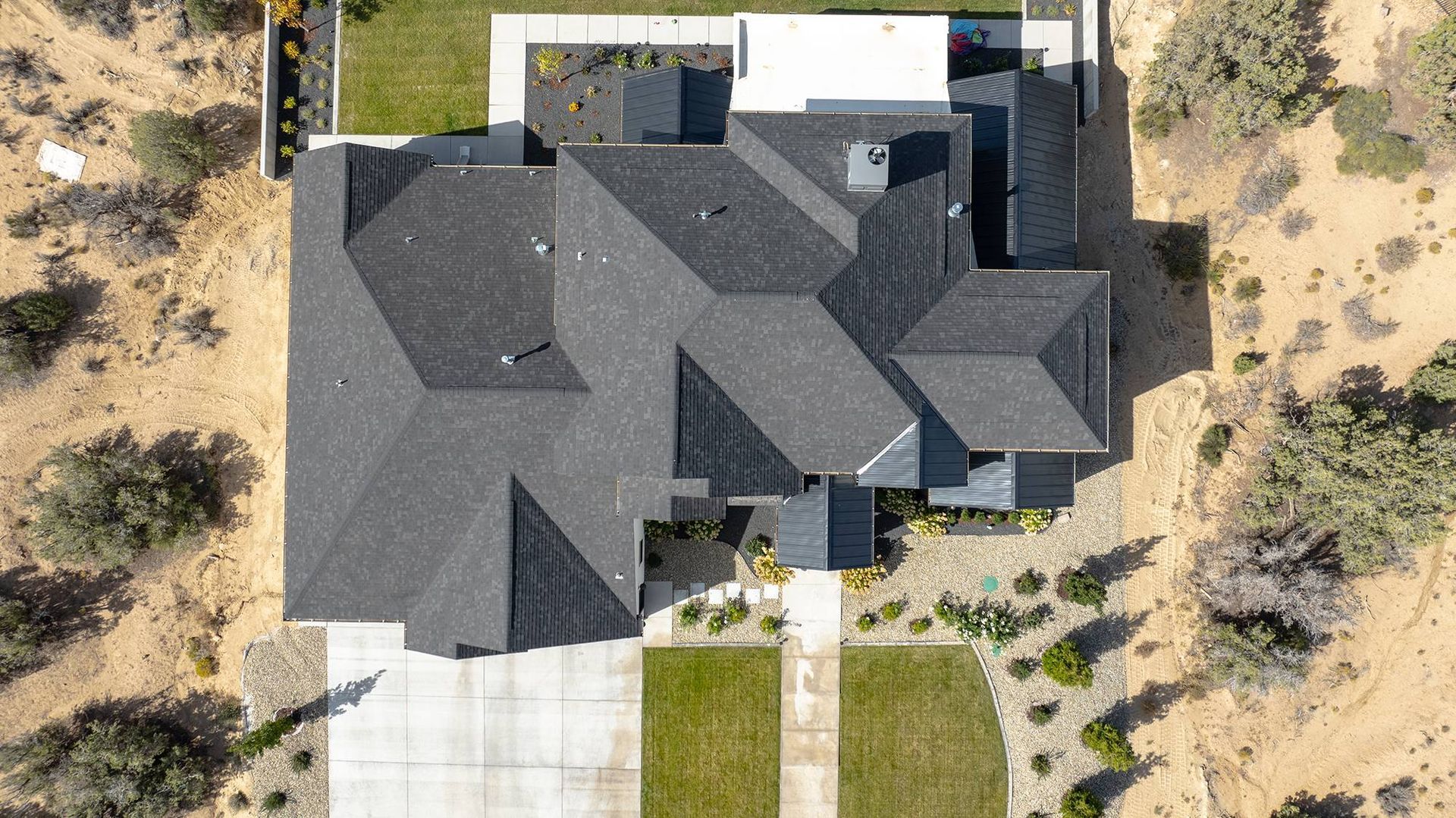 Roofing contractor evaluating whether a roof needs repair or replacement in Farmington, New Mexico