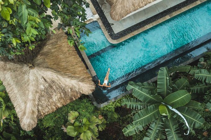 A woman into the pool and the tree on their side | Penrith, NSW | Ian’s Pools Penrith