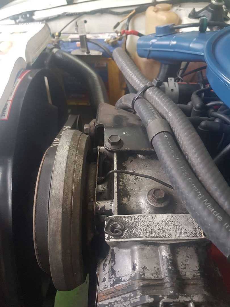 A Close Up Of A Car Engine With Hose Attached To It — Airborne Auto Air in Killarney Vale, NSW