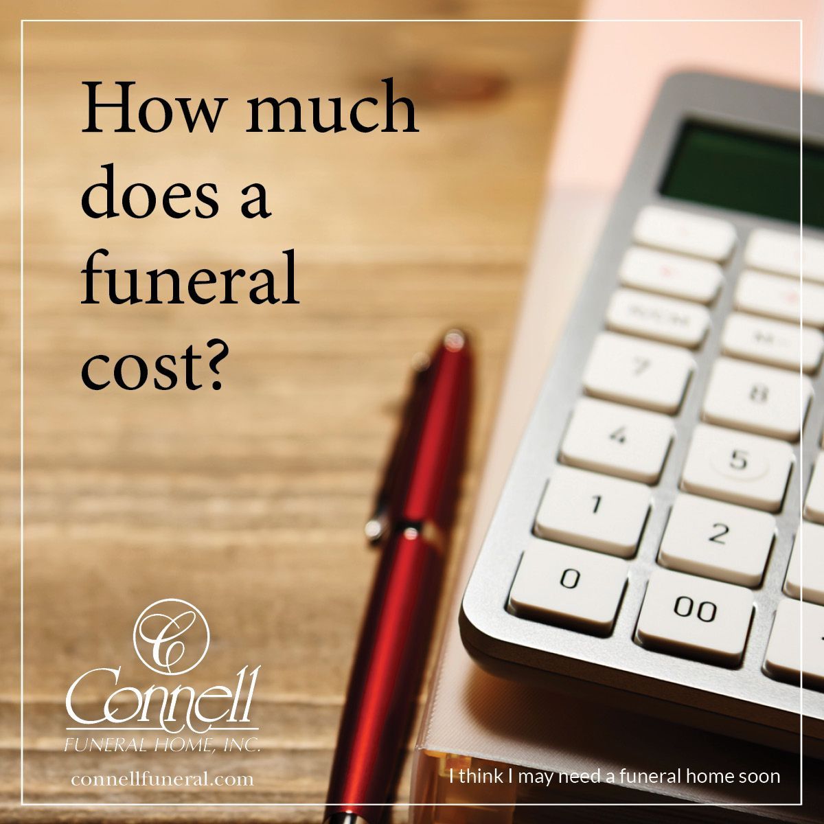 a calculator is sitting on a wooden table next to a pen .