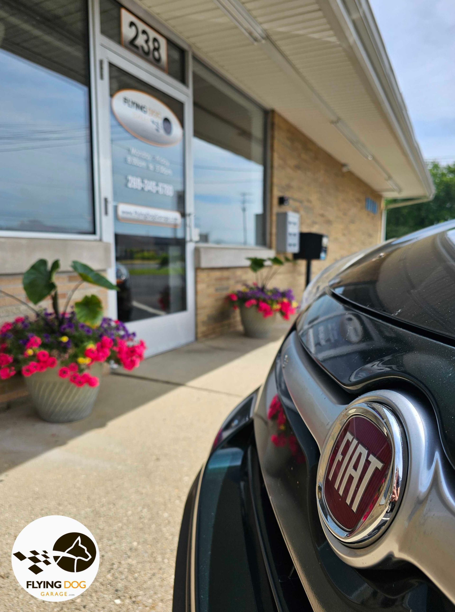 Fiat Parked in Front of The Shop | Flying Dog Garage