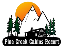 Logo for Pine Creek Cabins Resort featuring a log cabin, evergreen trees, and snow-capped mountains against an orange sun.