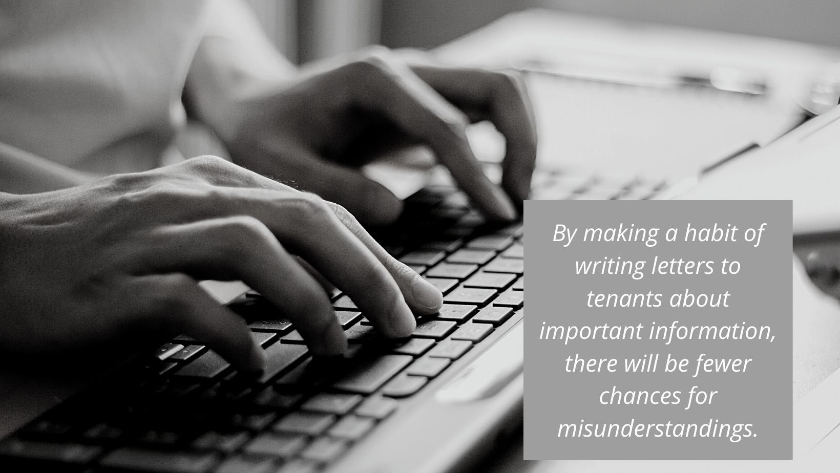 landlord typing a letter on a computer to a tenant