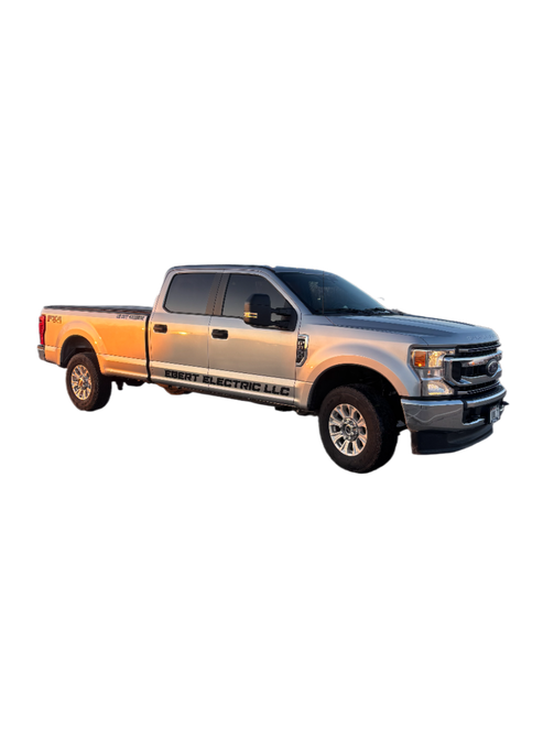 A silver and orange pickup truck on a white background.