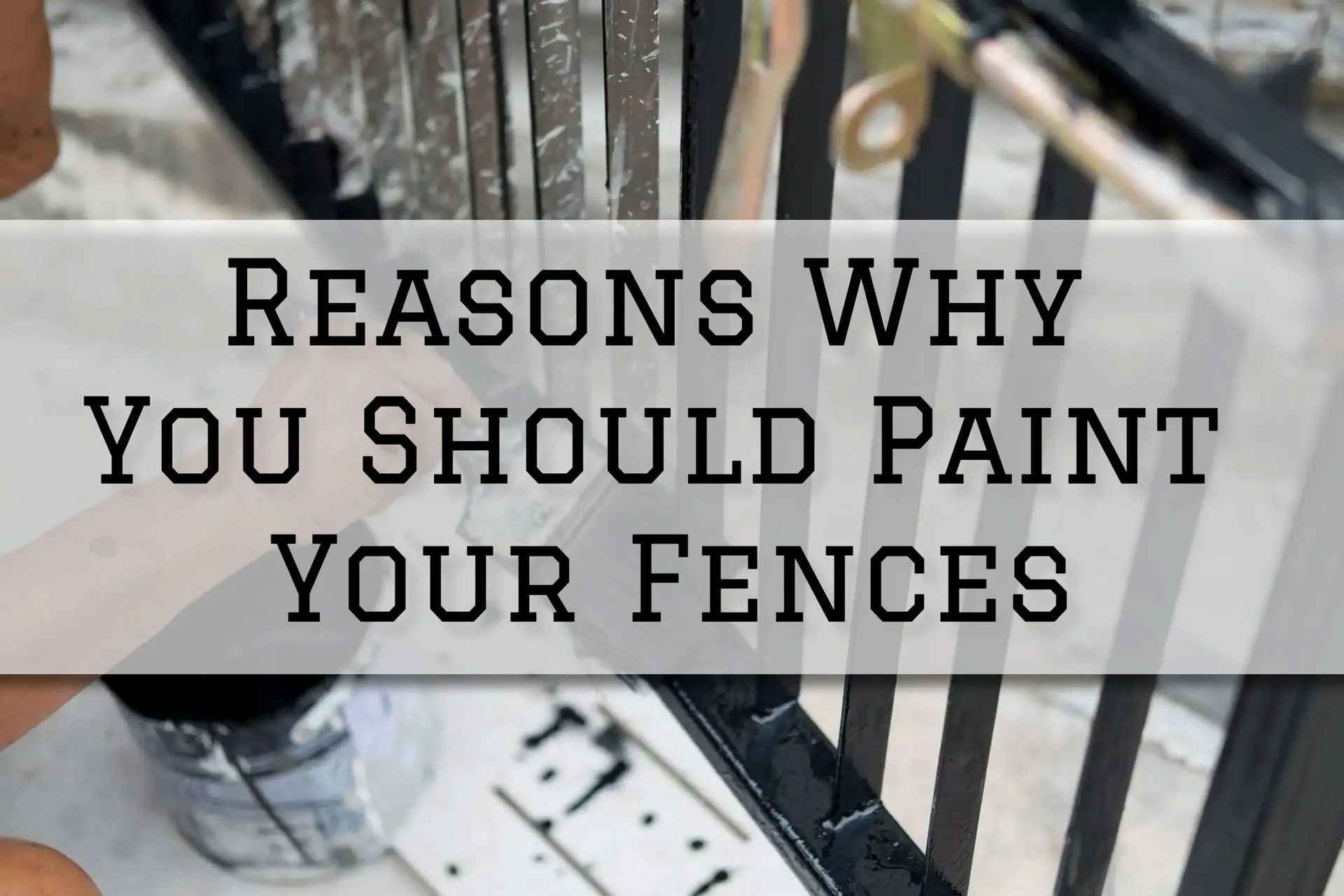 Fence being painted black. Text overlay: