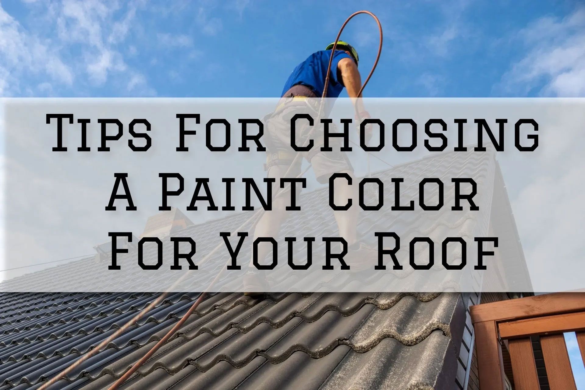 Roofer on a roof. Text overlay: Tips for choosing a paint color for your roof.