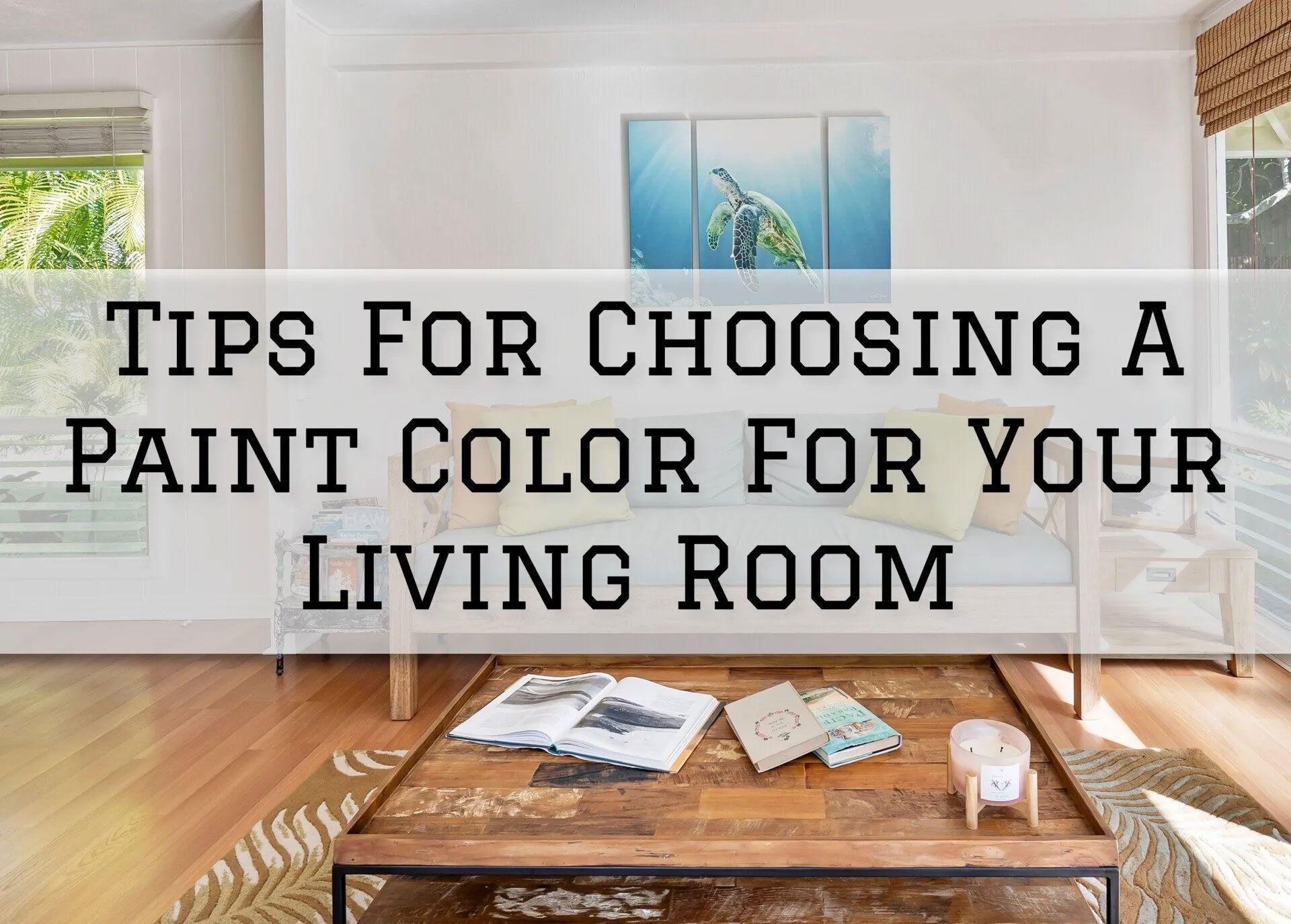 Living room with coffee table, couch, and tips on choosing paint color.