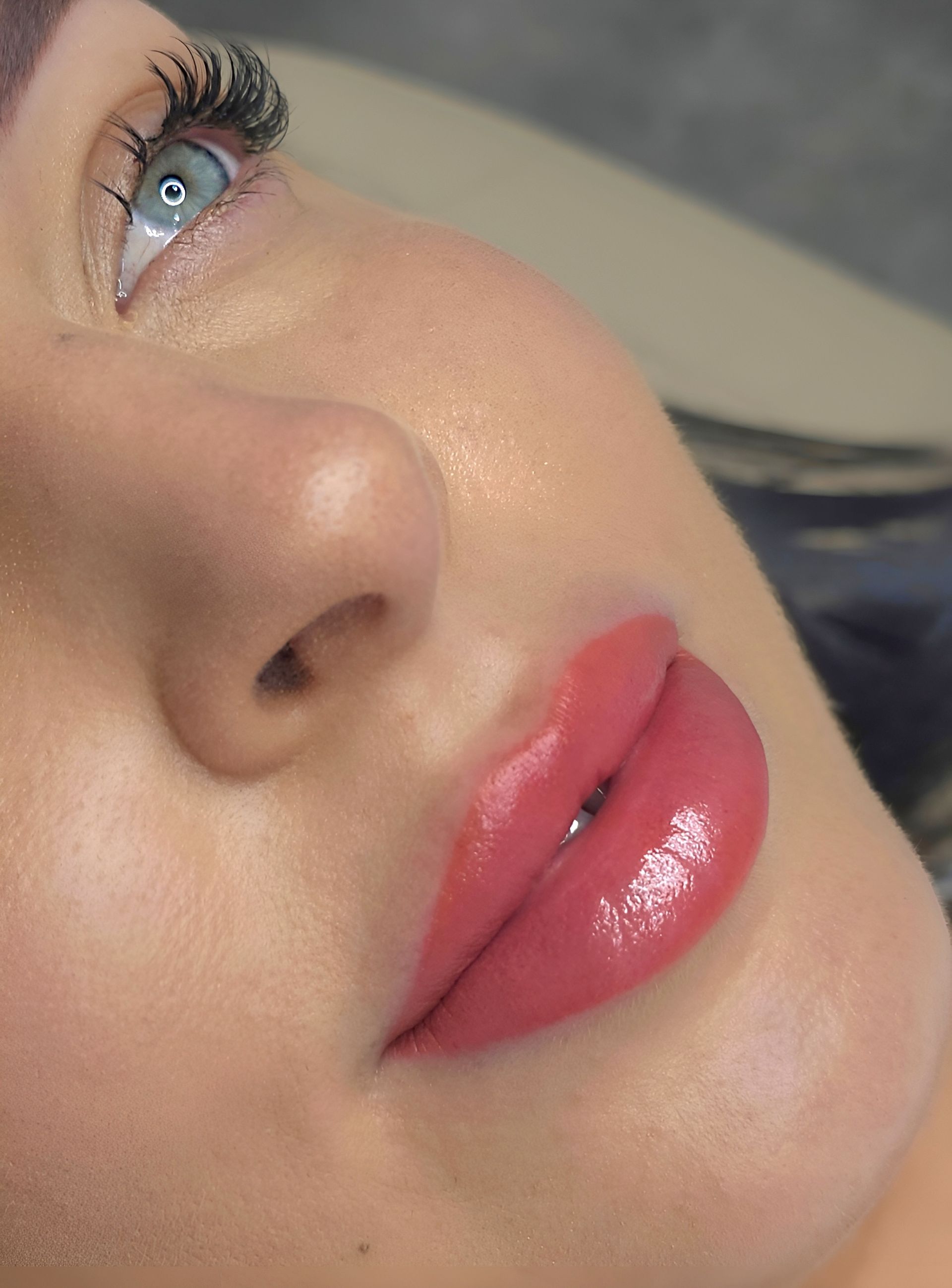 Close-up of a Person's Face; Full, Glossy, Pink-red Lips — On Point Cosmetic Tattoo Studio In Buderim, QLD