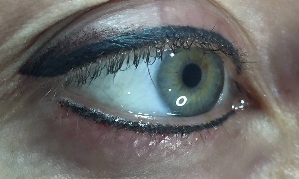 Close-up of a Human Eye With Green Iris, Black Eyeliner, and a Slight Upward Gaze — On Point Cosmetic Tattoo Studio In Buderim, QLD