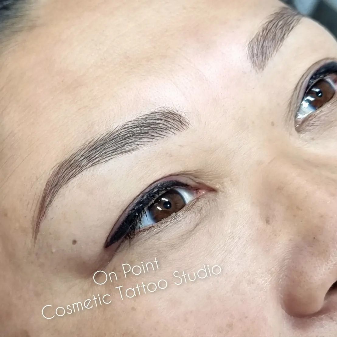 Close-up of a Person's Eyes With Tattooed Eyebrows and Eyeliner — On Point Cosmetic Tattoo Studio In Buderim, QLD