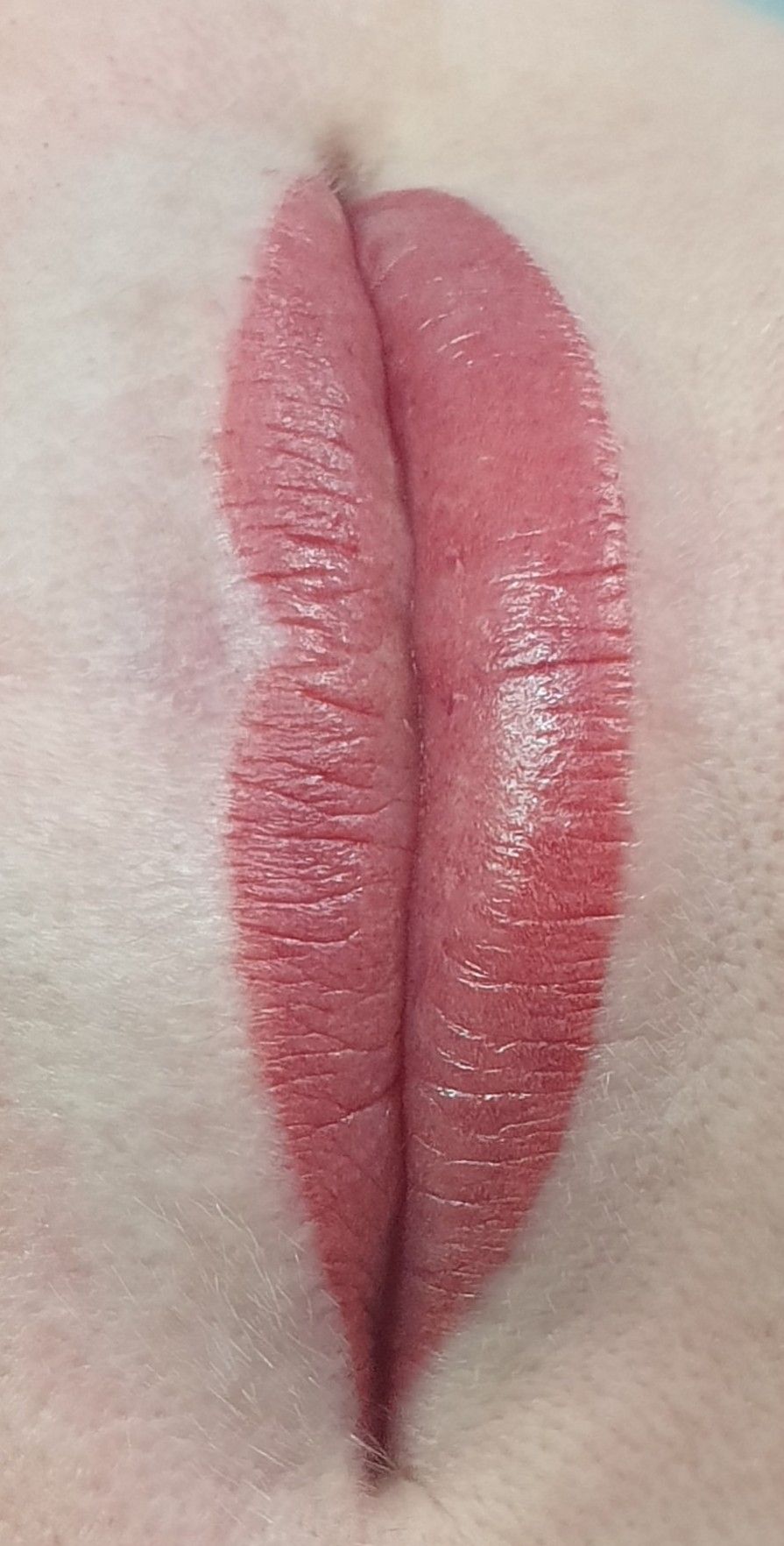 Close-up of Human Lips With Applied Red Lipstick — On Point Cosmetic Tattoo Studio In Buderim, QLD