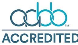 ABHE accredited logo in blue and gray text with stylized letters above the word “ACCREDITED”
