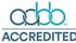 ABHE accredited logo in blue and gray text with stylized letters above the word “ACCREDITED”