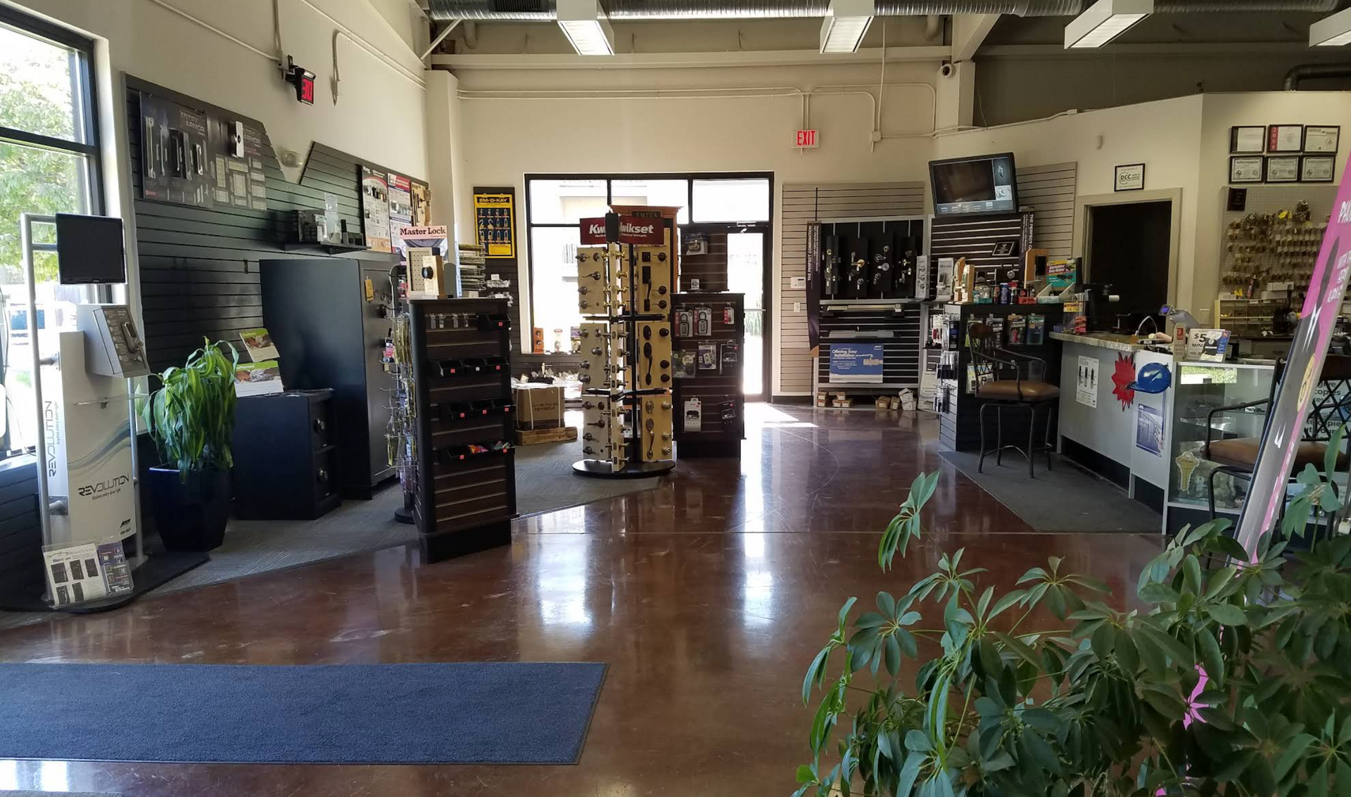 Interior of Rueschhoff Locksmiths showing the display cases with many door knobs and locks.