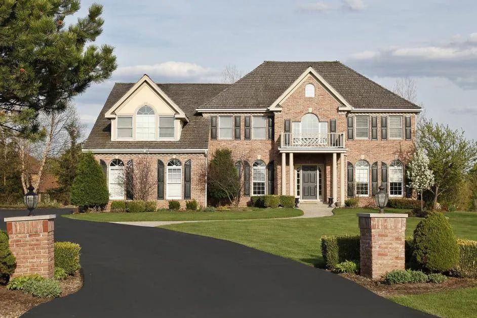 Home Entrance with Asphalt Road — Harrisburg, NC — Bryer & Son Asphalt Paving