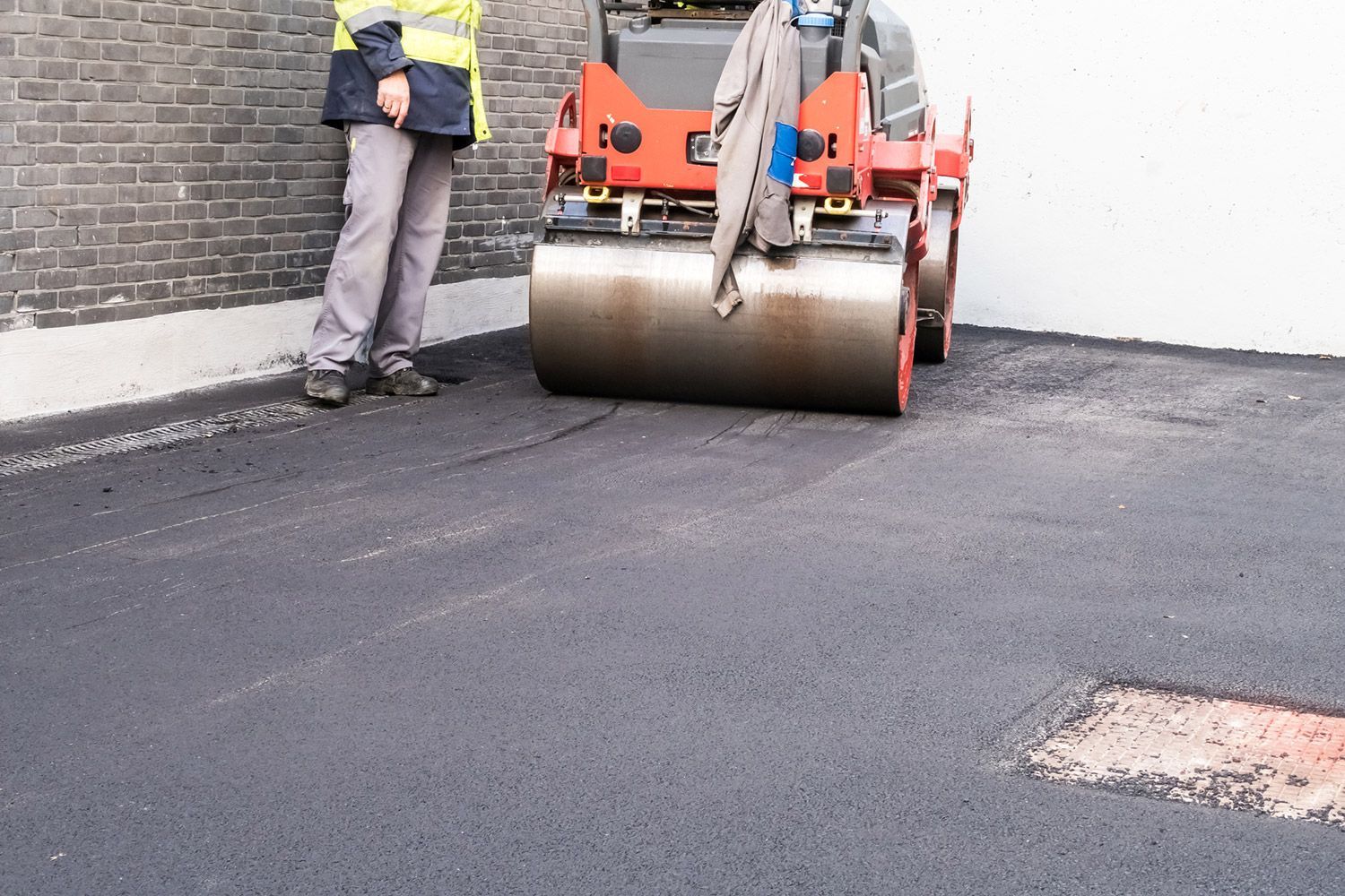 Asphalt Roller on Driveway — Harrisburg, NC — Bryer & Son Asphalt Paving