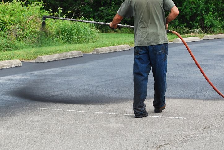 Sealcoating the Street Road — Harrisburg, NC — Bryer & Son Asphalt Paving Sealcoating the Street Road — Harrisburg, NC — Bryer & Son Asphalt Paving