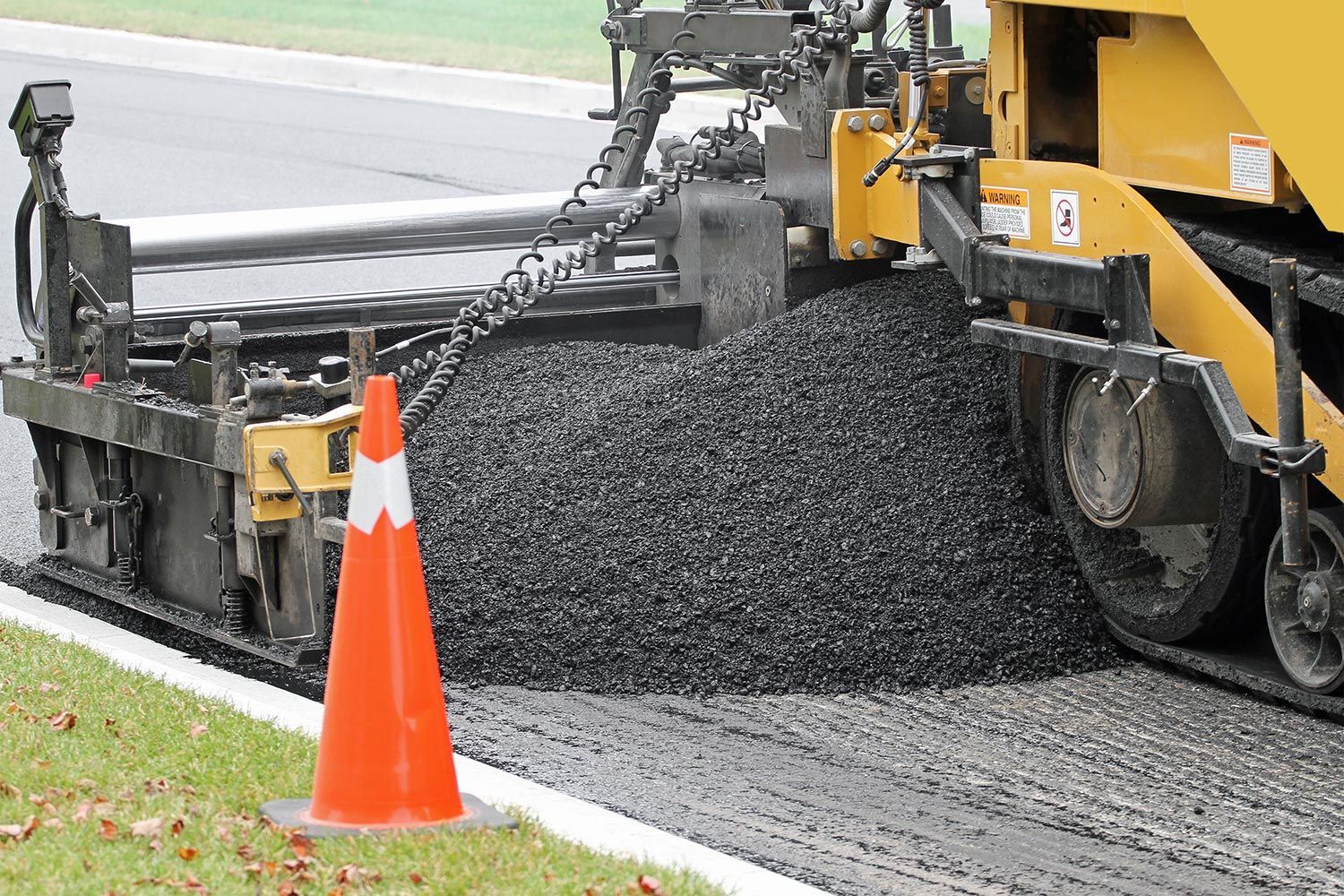 Asphalt Pouring on Commercial Road — Harrisburg, NC — Bryer & Son Asphalt Paving Asphalt Pouring on Commercial Road — Harrisburg, NC — Bryer & Son Asphalt Paving