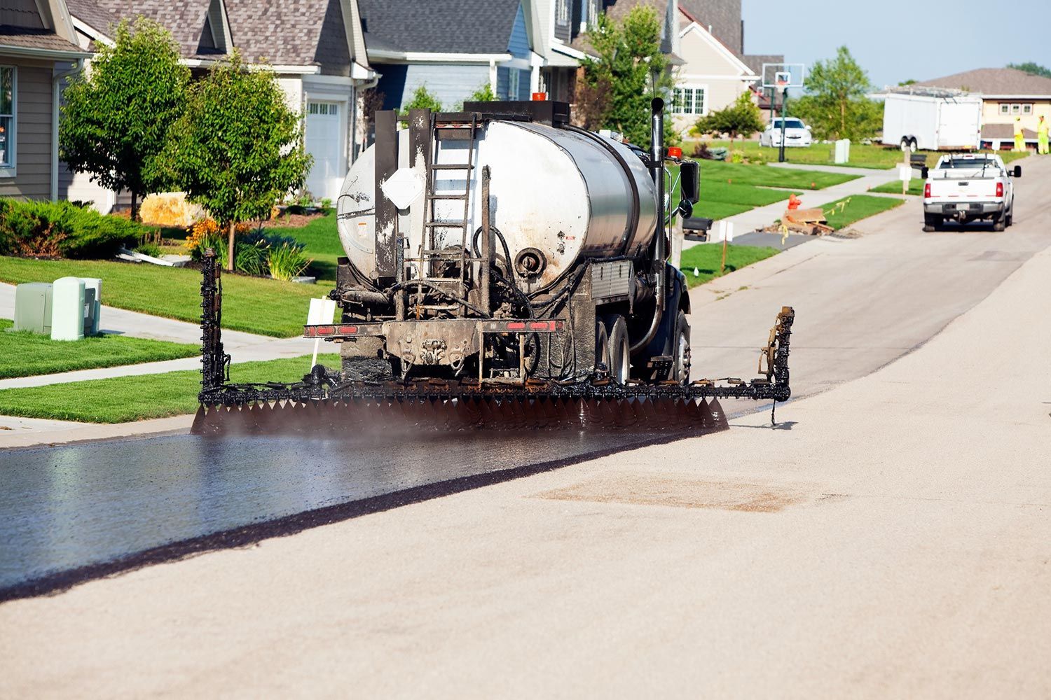 Sealcoating with Truck — Harrisburg, NC — Bryer & Son Asphalt Paving Sealcoating with Truck — Harrisburg, NC — Bryer & Son Asphalt Paving