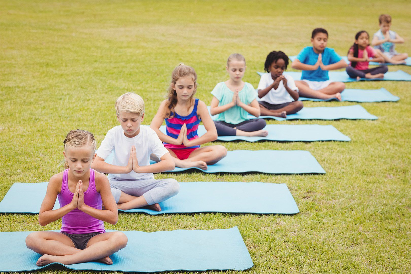 chlidren doing yoga