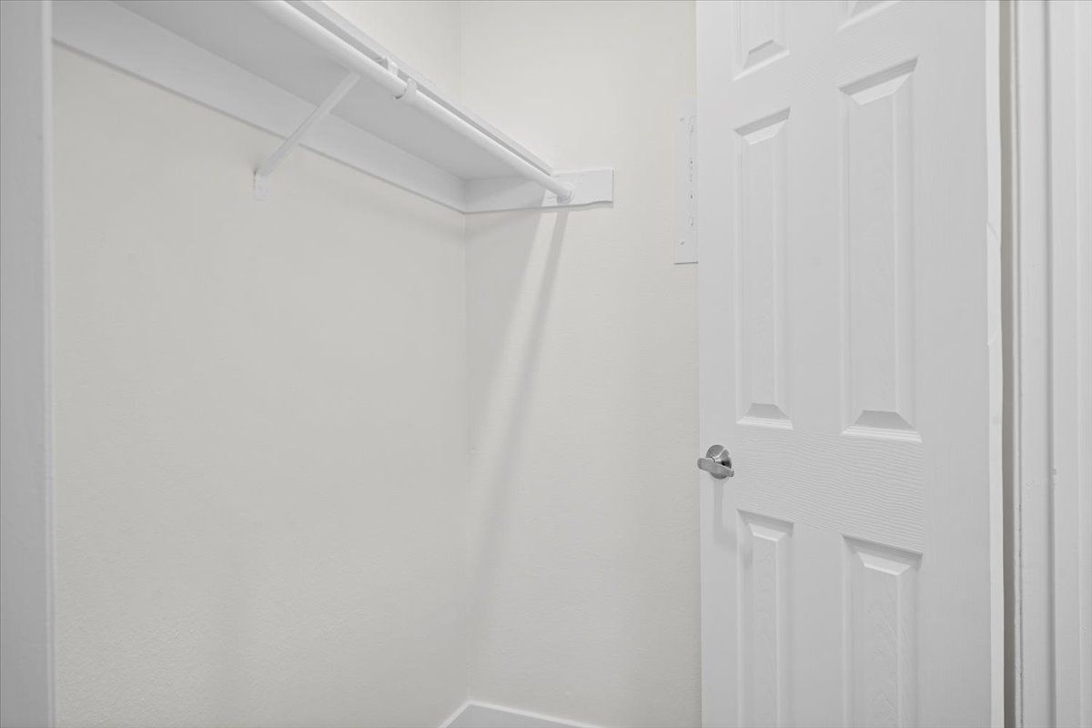 Bedroom with spacious closet in Sherwood Forest Apartments
