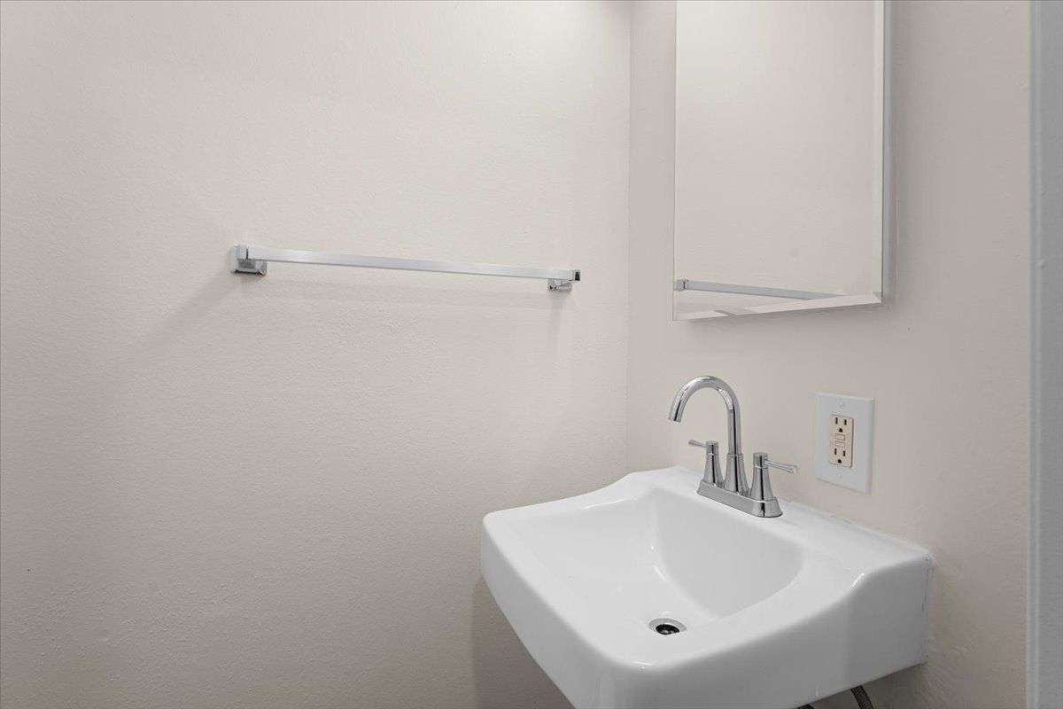 Bathroom with updated fixtures in Sherwood Forest Apartments
