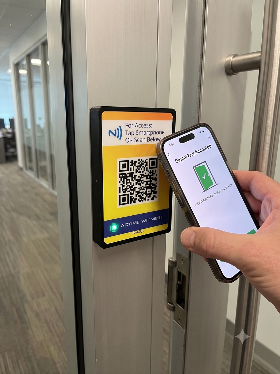 Smartphone unlocking an office door using the Active Witness Smart Tap reader with QR code