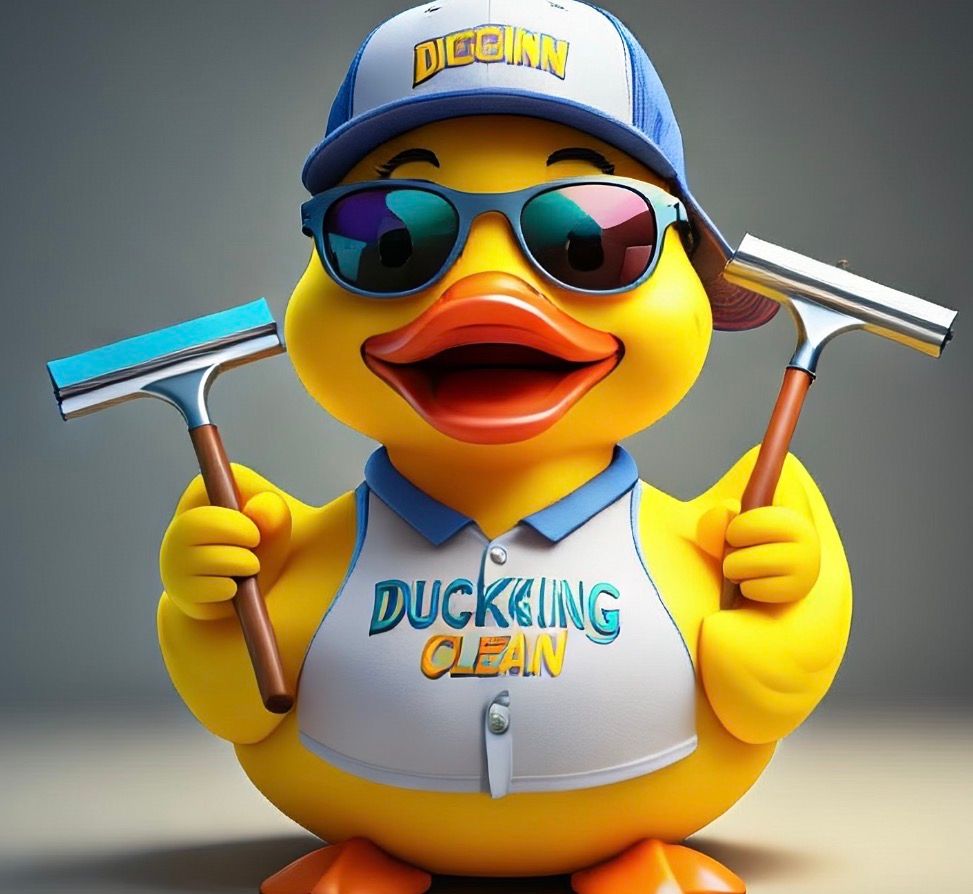 Yellow duck mascot in cap and sunglasses, holding a window squeegee and cleaning tool, with “Ducking Clean” shirt