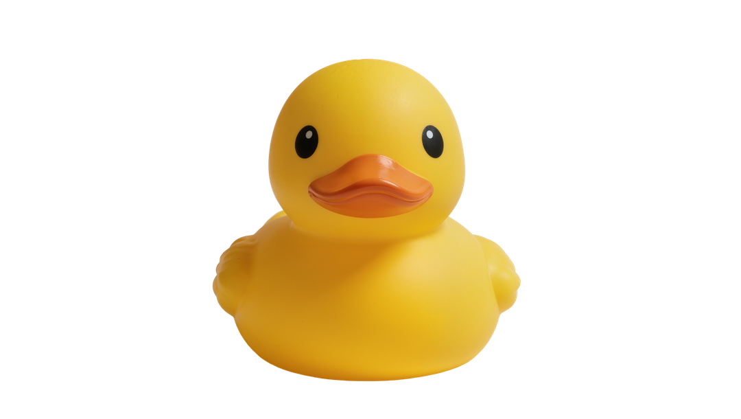 Yellow rubber duck with black eyes and orange beak on a white background
