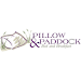 A pillow and paddock logo on a white background.