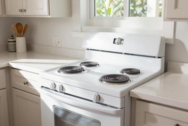 Freestanding white electric stove in a Florida residential kitchen