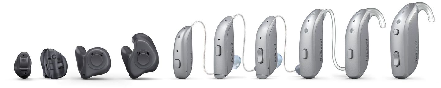 Various hearing aid styles, ranging in size and design.