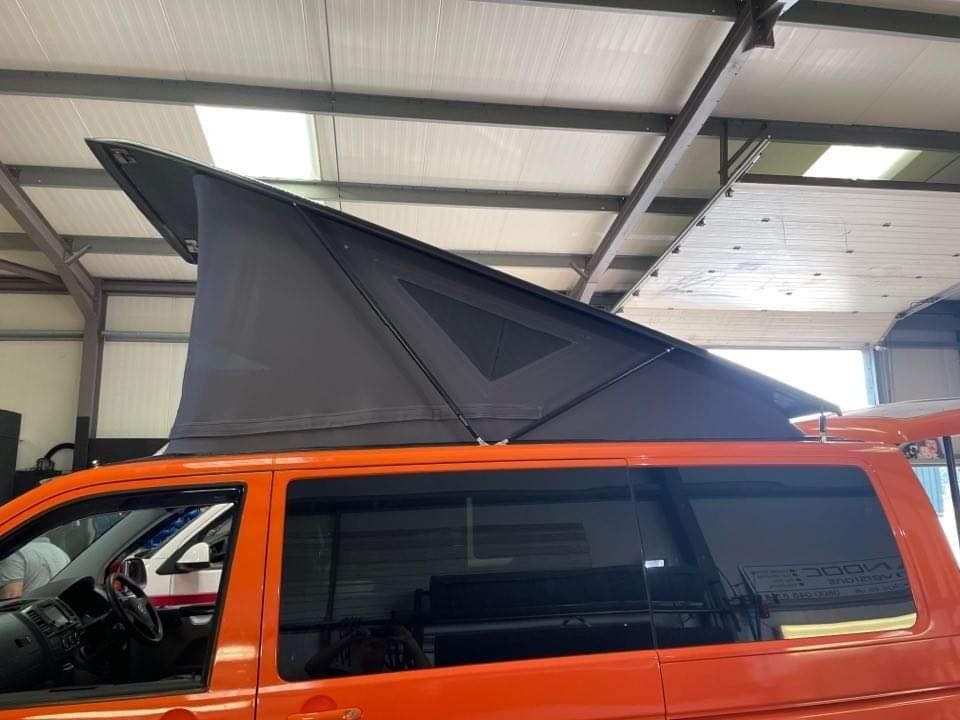 Stealth low profile pop top roof
