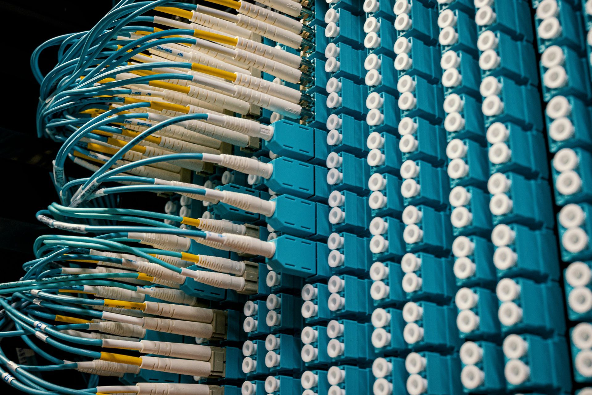 A bunch of blue and white wires are stacked on top of each other.