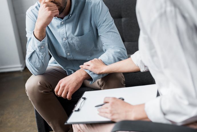 Man getting evaluated for mental health