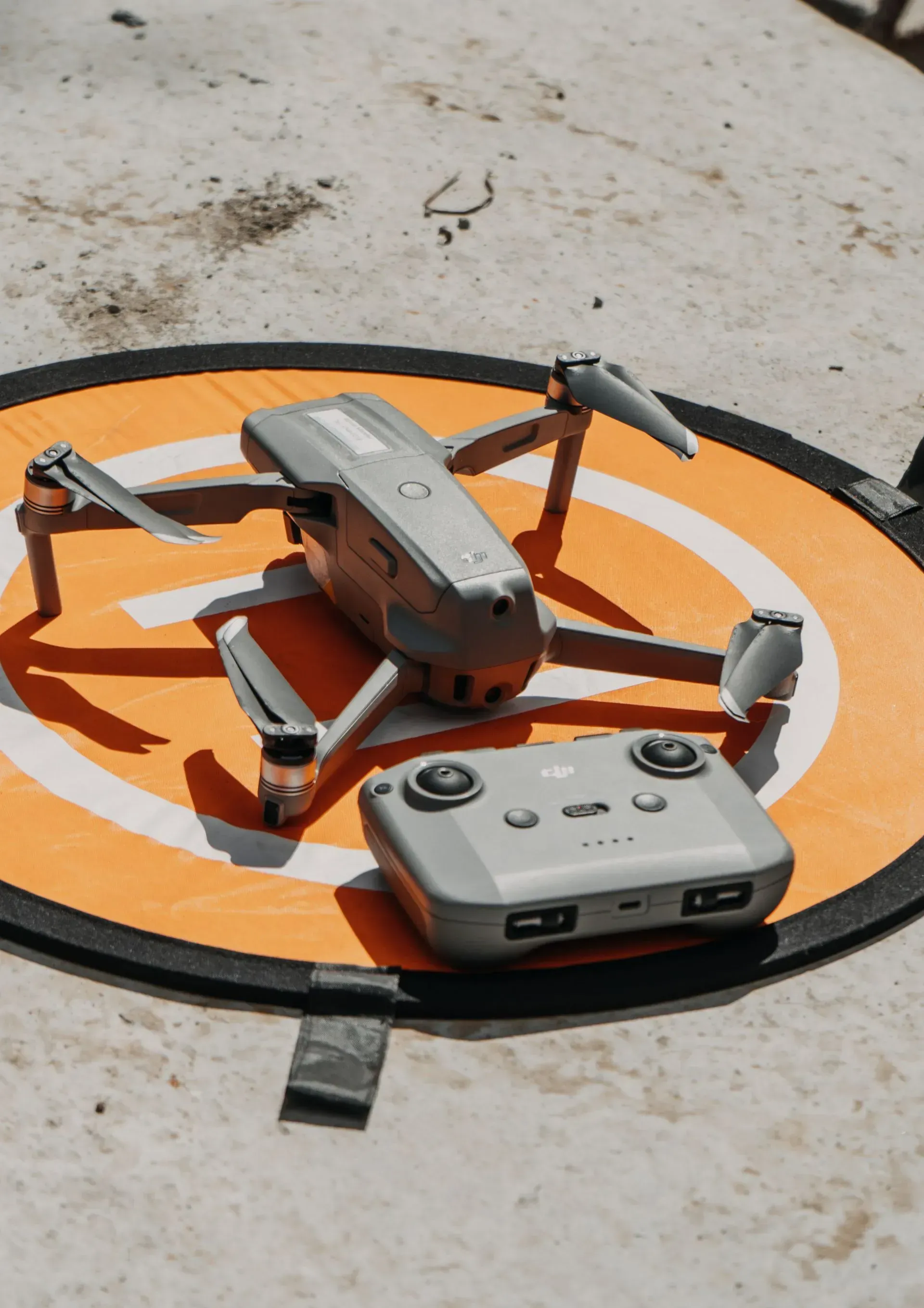 drone ready to take off on orange helipad