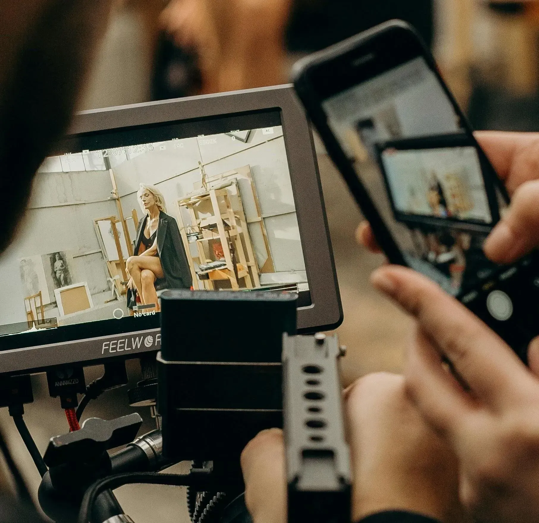 two screens working on vide footage from a video shoot