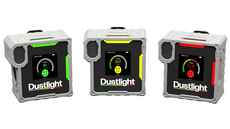 Three Dustlight devices in black, yellow, and red, each with a glowing status ring on a white background