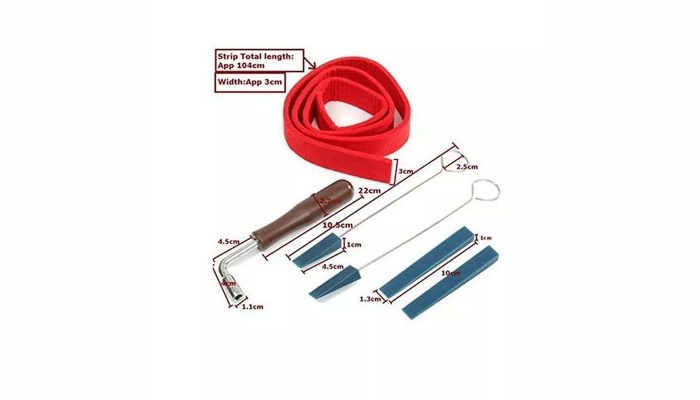 Piano tuning tools, including a tuning hammer, mutes, and a temperament strip, on a white background.