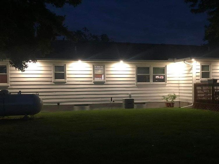 Modern House at Night — Electrical Repair in Toledo, Ohio