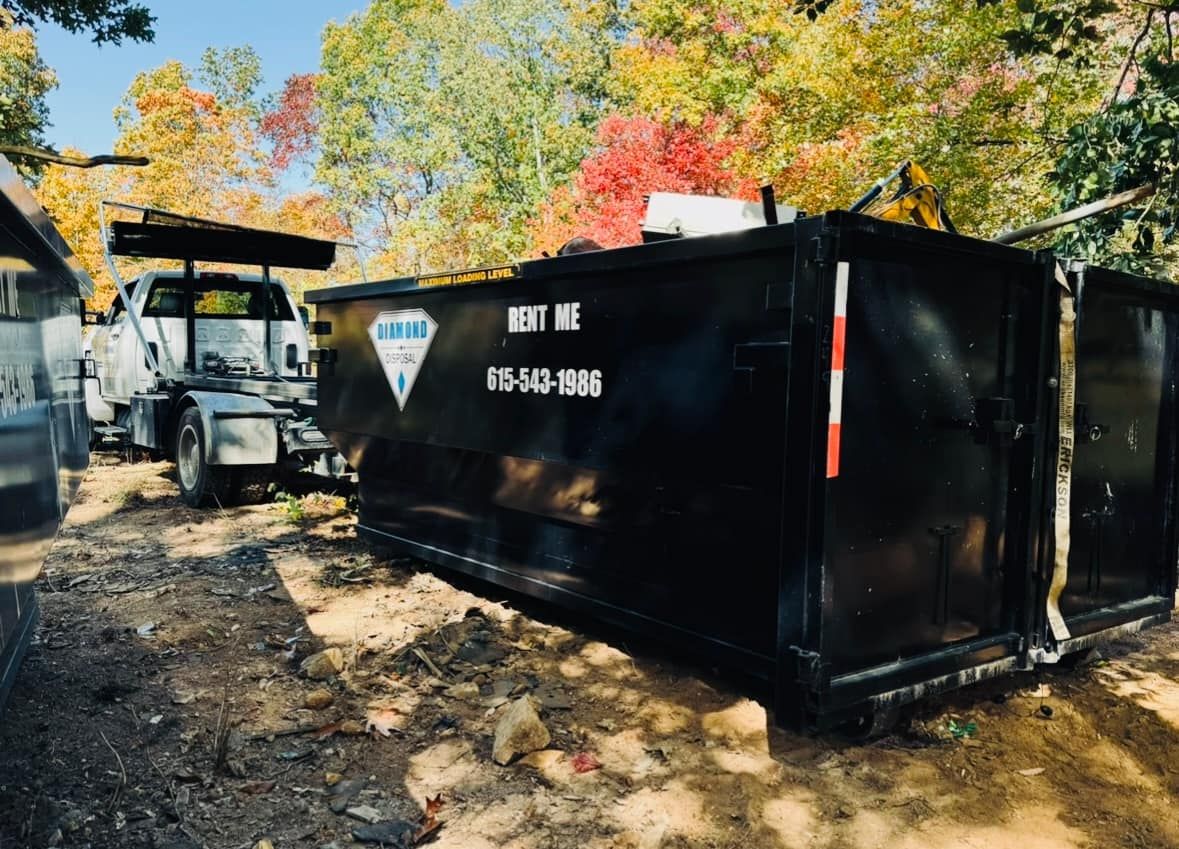A black dumpster with